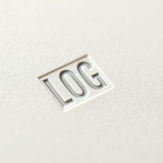 Embossed edition mark on paper corner