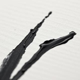 Macro of paper fiber with deep black ink