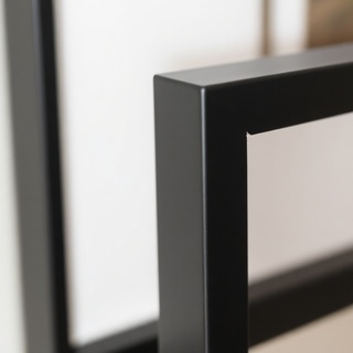 Solid frame corner with low-iron glass
